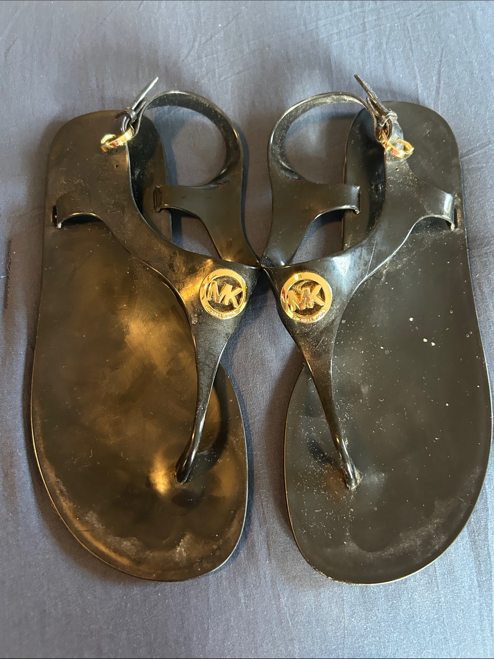 Michael Kors Black Jelly Thong Sandals with Gold MK Medallions